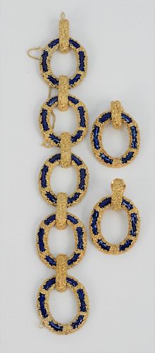 Three Piece Set, to include 18 karat gold and blue enameled bracelet, and pair of earrings having rough finish centered with blue enameling. 103 grams
