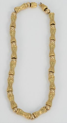 18 Karat Gold Necklace, made up of elongated and ball sections. length 18 1/2 inches, 117.3 grams.