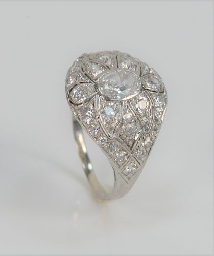 Platinum and Diamond Ring, with center oval diamond approximately one carat, surrounded by diamonds in filigree setting. center stone 4.8 millimeters 