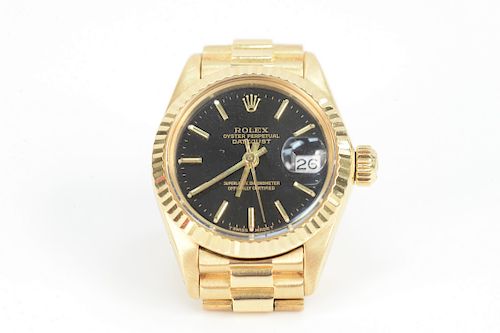 Rolex 18 Karat Gold Ladies Wristwatch, oyster perpetual datejust with original box, T68 6917. total weight 66.1 grams.