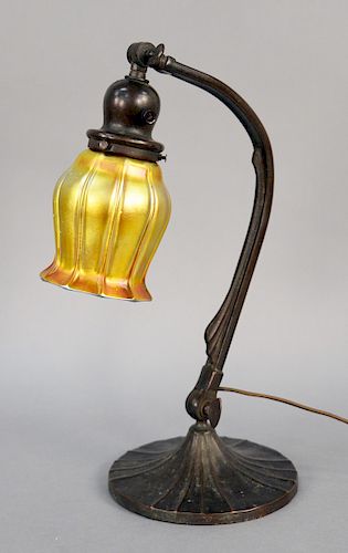 Handel Desk Lamp, with bronze adjustable base on round ribbed base marked Handle with Quezal gold iridescent shade, signed Quezal. height 16 3/4 inche