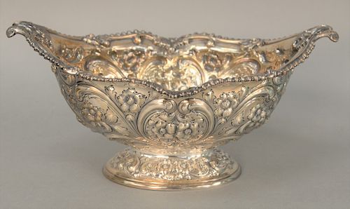 Howard and Company Sterling Silver Oval Center Bowl, with repousse body set on oval repousse foot. height 6 inches, length 12 1/2 inches, 33.4 troy ou
