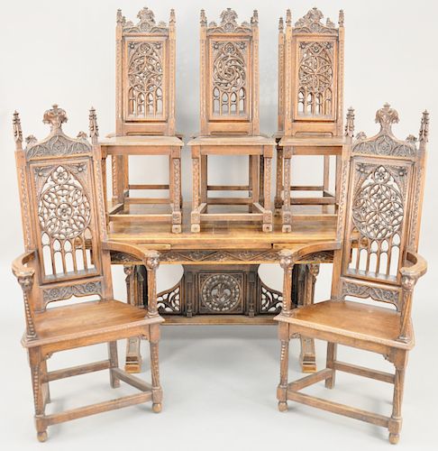 Thirteen Piece Oak Dining Set, gothic taste, to include hutch with a large backboard, sideboard, set of eight chairs, extension table, small table and