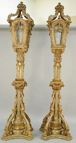 Pair of Italian Baroque Style Floor Lanterns, venetian taste parcel gilt, carved wooden lights having domed lantern with four frosted glass doors bene