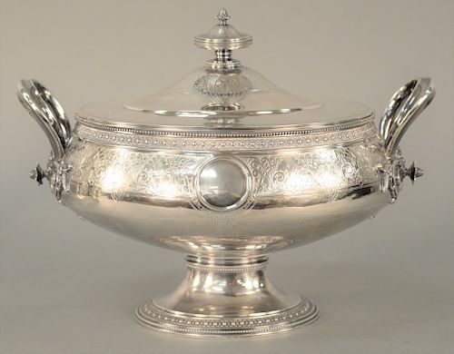 Brown and Spaulding Sterling Silver Covered Tureen, having round finial over chased body with two large handles, all set on oval base marked Brown and