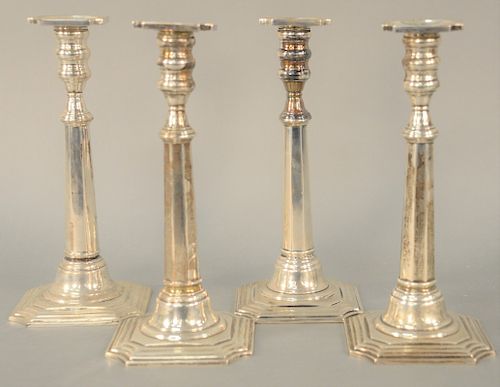 Set of Four Sterling Silver Candlesticks, weighted. height 10 1/4 inches.