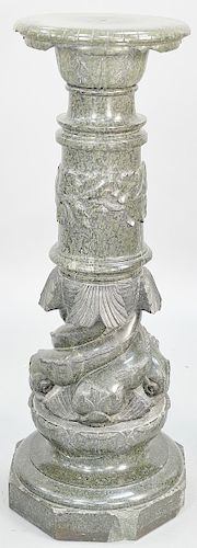 Green Granite Pedestal having carved fish (chips to top and base). height 43 inches, diameter 14 inches. Provenance: Slocomb Brown Villa Newport Rhode