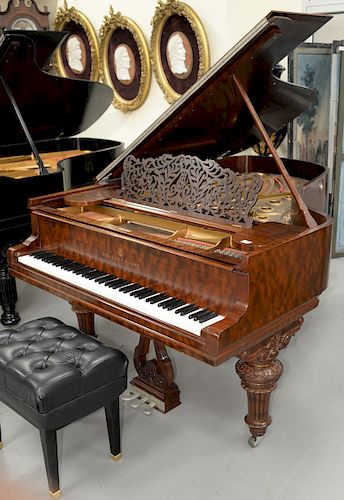 Steinway and Sons Grand Piano, plum pudding mahogany and bench, model B, serial number 82497, 1895, very clean. length 82 inches.