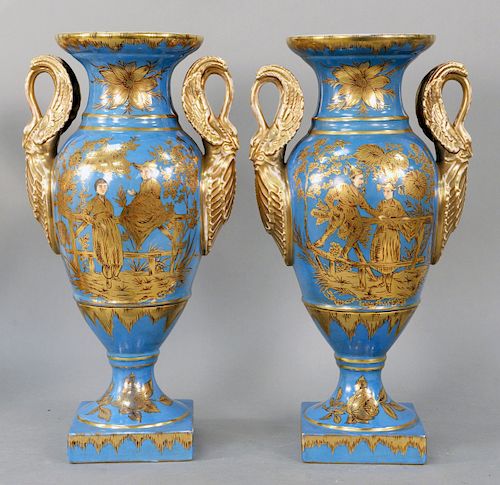Pair of French Porcelain Vases, Chinoiserie decorated having large swann handles, celeste blue ground with gilt gold painted Oriental scenes. height 1