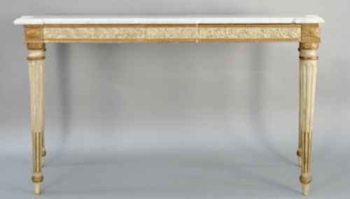 Louis XVI Style Gilt and Cream Painted Table with Shaped Marble Top Console, having two drawers on turned fluted legs. height 32 inches, width 58 inch