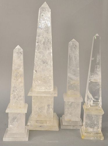 Set of Four Rock Crystal Obelisks, one clear crystal raised on sphere and mounted on rectangular base, pair neoclassical style (repaired), and large o