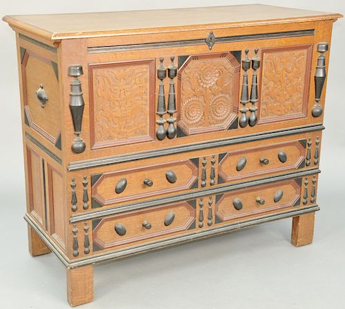 Margolis Oak Sunflower Chest, having lift top, three carved panels over two drawers. height 40 1/2 inches, top: 21 1/2" x 49".