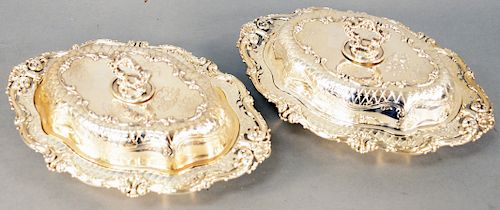 Pair of Redlich and Company Sterling Silver Covered Vegetable Dishes, oval shaped with rococo borders, marked for Redlich and Company New York, marked