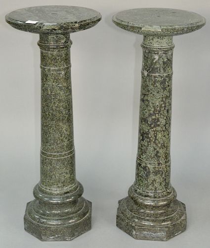 Pair of Green Granite Pedestals, on octagon bases (chips on top). height 34 inches, diameter 14 inches. Provenance: Slocomb Brown Villa Newport Rhode 