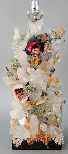 Large Grotto Rock Crystal Table Lamp Sculpture, having rock crystal amethyst, mineral specimens, semi precious stones and bird figures, in the manner 