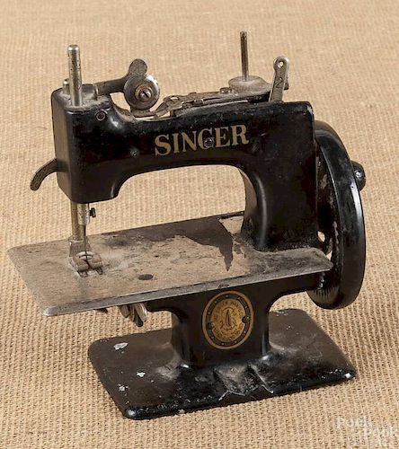 Child's toy Singer sewing machine, 6 1/2'' h.