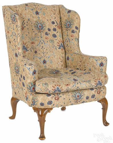 Queen Anne style mahogany wing chair.