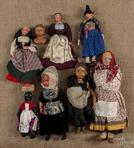 Group of ethnographic dolls.