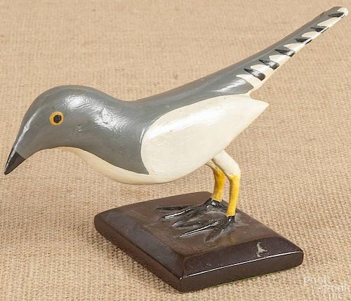 Carved and painted pine bird, mid 20th c., 9'' l.