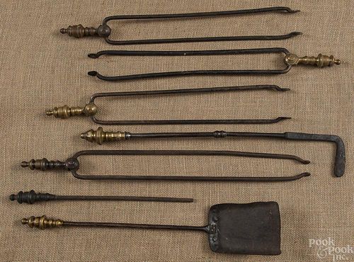 Four fireplace tongs, ca. 1800, together with a s