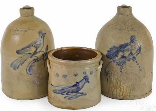 Two stoneware jugs, 19th c., with cobalt bird dec