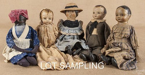 Eight contemporary oil cloth and composition doll