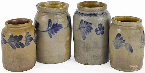 Four stoneware jars, 19th c., with cobalt floral