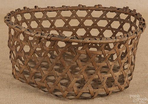 Split oak cheese basket, 19th c., 9'' h., 17 3/4''