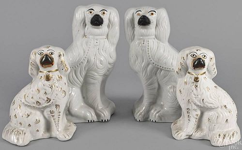 Two pairs of Staffordshire spaniels, 19th c., 13