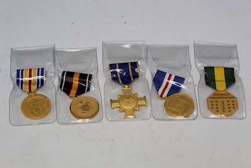 Five US government service medals.