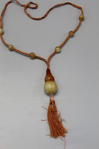 Carved soapstone necklace.