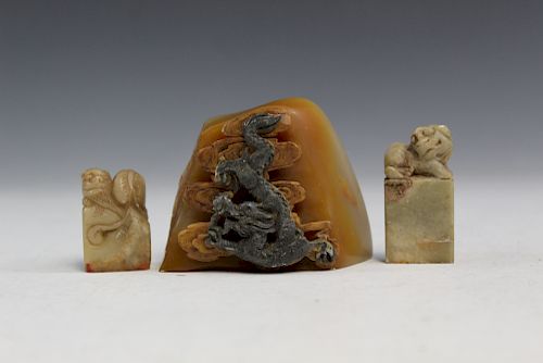 Three Chinese carved soapstone seals.