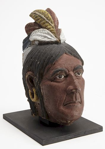 Carved and Painted Stone Head of an Indian