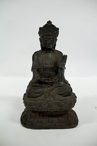 A Large Cast Metal Figure of Guanyin.