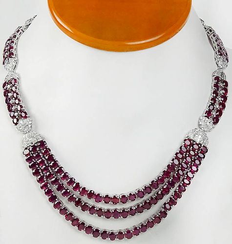 Fine Quality Approx. 85.00 Carat Oval Cut Ruby, 6.0 Carat Round Cut Diamond and 18 Karat White Gold Necklace