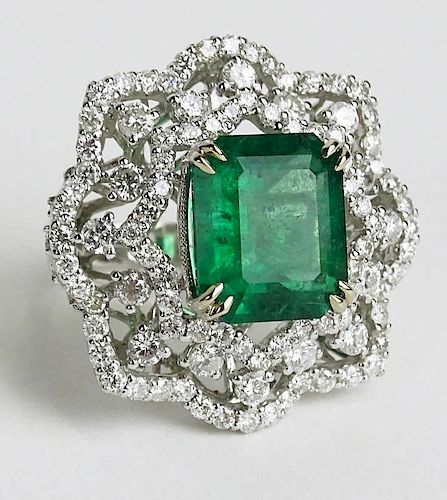 GIA Certified 7.08 Carat Octagonal Step Cut Emerald, approx. 3.72 Carat Round Cut Diamond and 18 Karat White Gold Ring