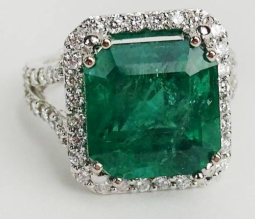 GIA Certified 9.71 Carat Octagonal Step Cut Emerald, approx. 1.21 Carat Round Cut Diamond and 18 Karat White Gold Ring