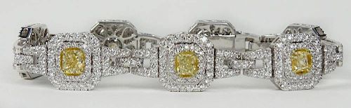 EGL Certified 7.15 Carat Seven (7) Rectangular Cut Fancy Yellow-Fancy Intense Yellow Diamond and 18 Karat White Gold Bracelet