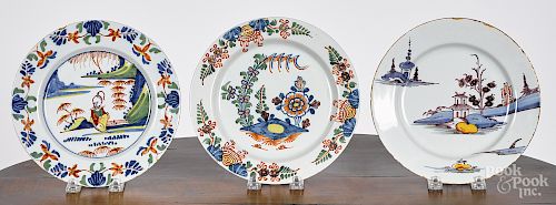 Three Delft polychrome plates