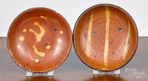 Two miniature redware plates