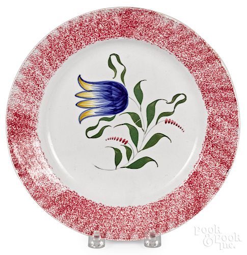 Red spatter plate, with blue tulip