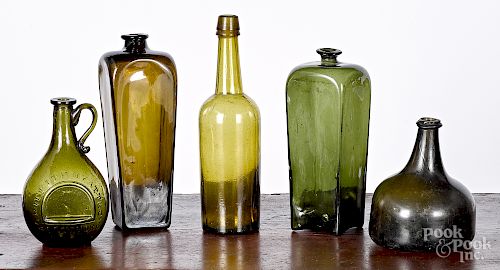 Five glass bottles