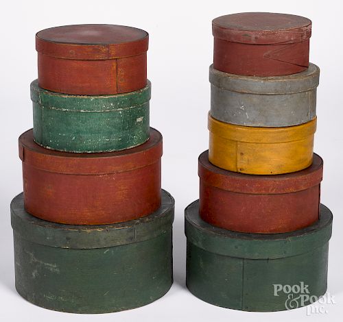 Nine painted bentwood boxes