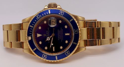 JEWELRY. Men's Rolex 18kt Gold Submariner Watch.