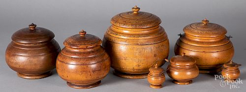 Seven turned peaseware canisters