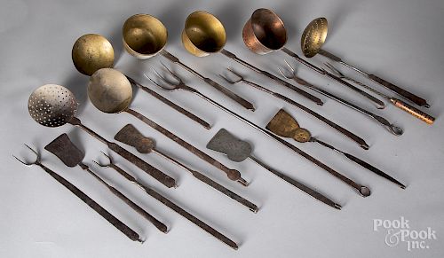 Group of wrought iron kitchen utensils