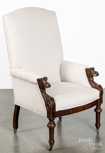 Victorian armchair, with carved doghead arms.