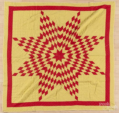 Pieced lone star quilt, early 20th c., 67'' x 67''.