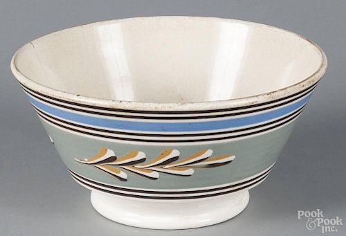 Mochaware bowl, 19th c., with a fern leaf band, 5'' h., 10'' dia.