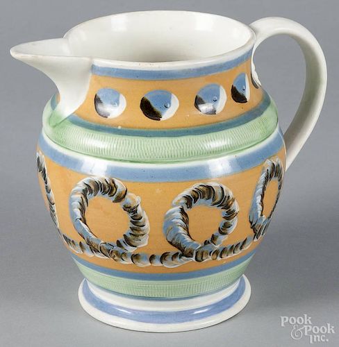 Mochaware pitcher, 19th c., with earthworm and cat's-eye decoration, 7 1/4'' h.